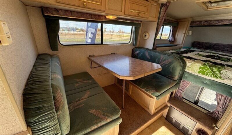 
								1996 Bigfoot 2500 10.6′ full									