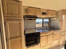 
										1996 Bigfoot 2500 10.6′ full									