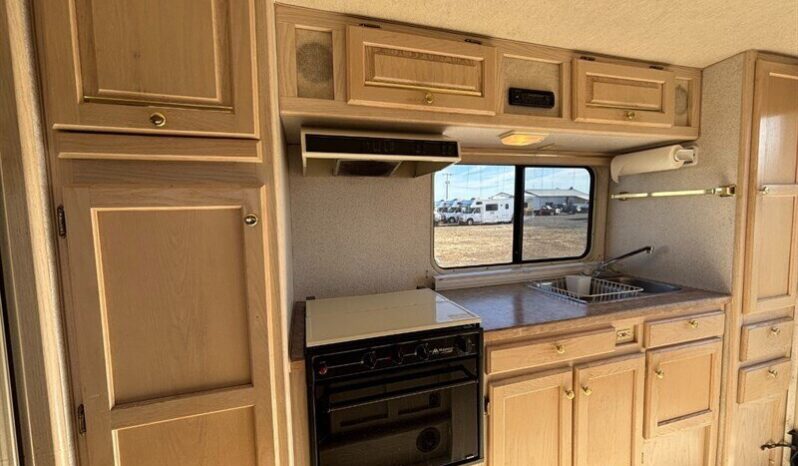 
								1996 Bigfoot 2500 10.6′ full									